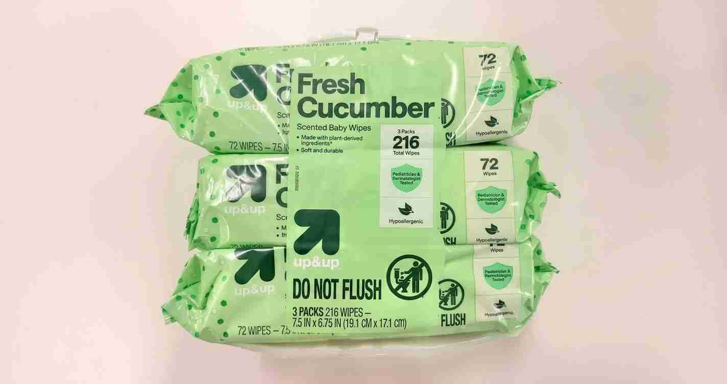 Two green Fresh Cucumber scented baby wipe packs stacked, with a prominent DO NOT FLUSH and 72 wipes per pack label.