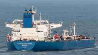 Cargo ship Advantage Angel with a blue hull and white superstructure sailing on the sea; the name ADVANTAGE ANGEL and MAJURO are visible on the stern.